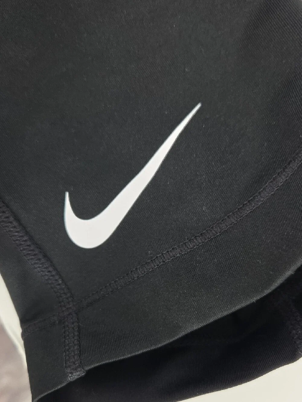 Nike Black Cropped Performance Leggings with White Logo